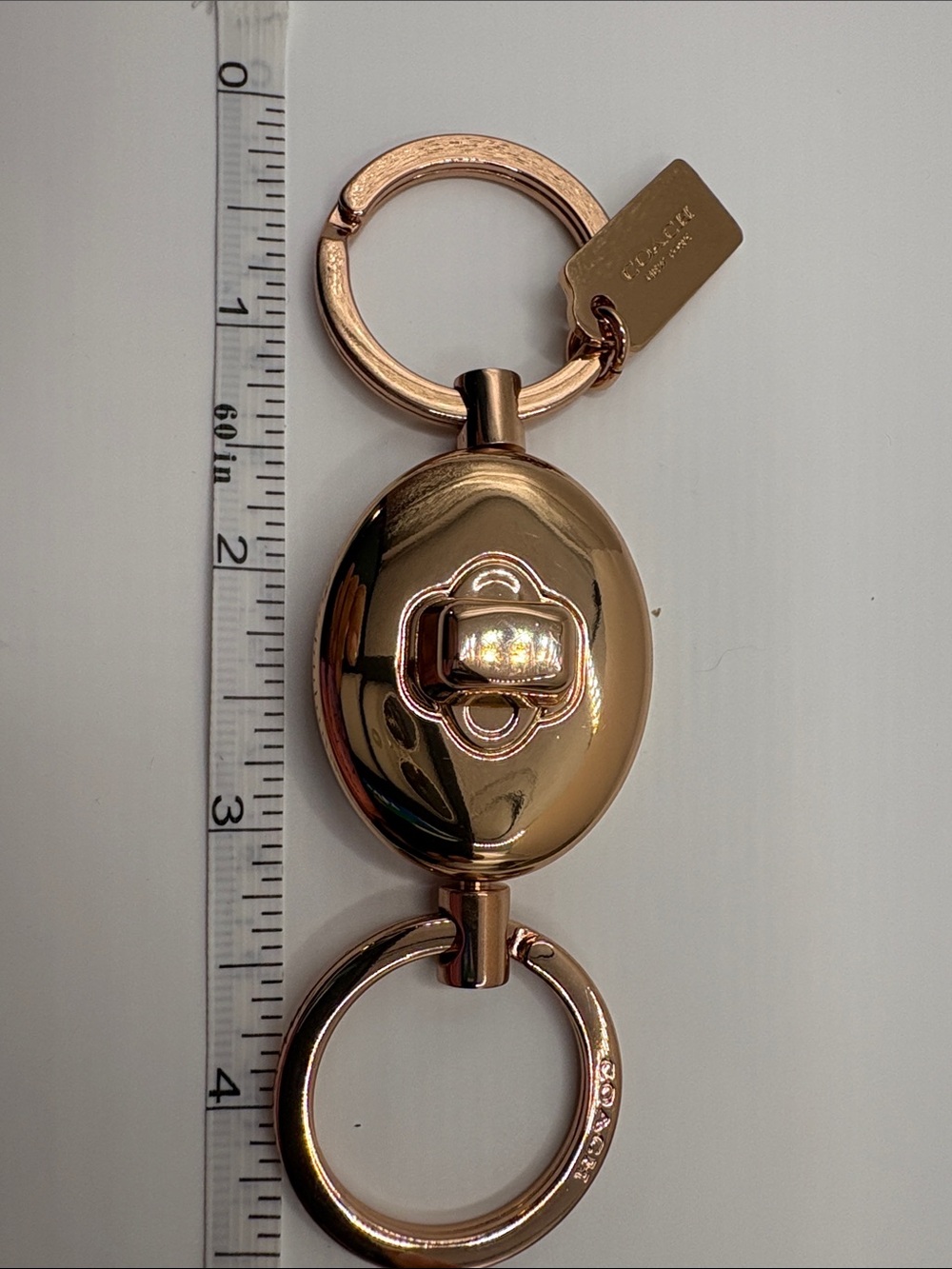 Coach Rose Gold Oval Valet Key Fob with Tag